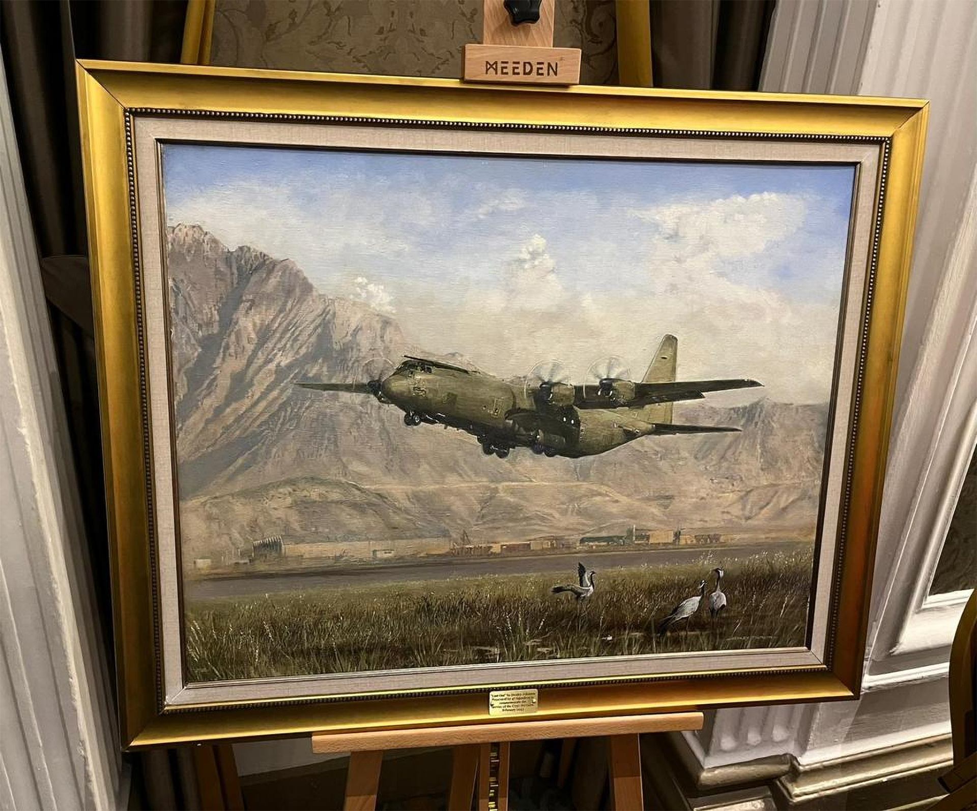 Earlier this month, personnel from Number 47 Squadron headed to the Royal Air Force Club to present the Hercules commemorative painting to its new home.